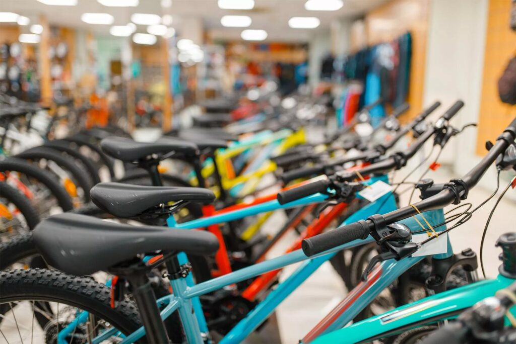 Rows Of Bicycles In Sports Shop Focus On Seat